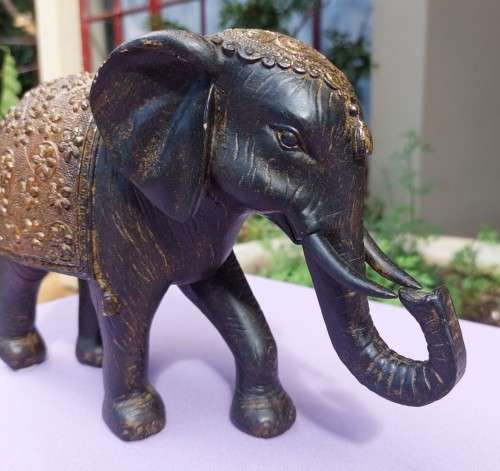 LUXURIOUS HANDMADE GOOD LUCK FENG SHUI RESIN STATUE OF A ROYAL ELEPHANT STRIDING FORWARD