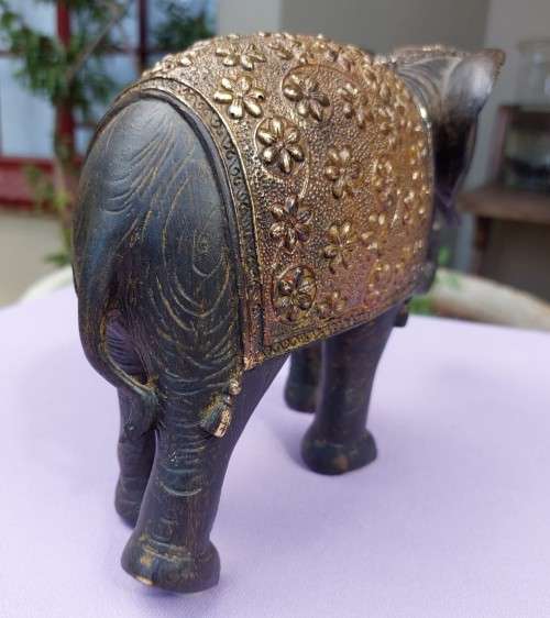 LUXURIOUS HANDMADE GOOD LUCK FENG SHUI RESIN STATUE OF A ROYAL ELEPHANT STRIDING FORWARD