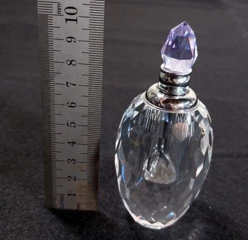 VINTAGE CHRYSTAL GLASS PERFUME BOTTLE WITH PURPLE COLOURED FACETTED STOPPER