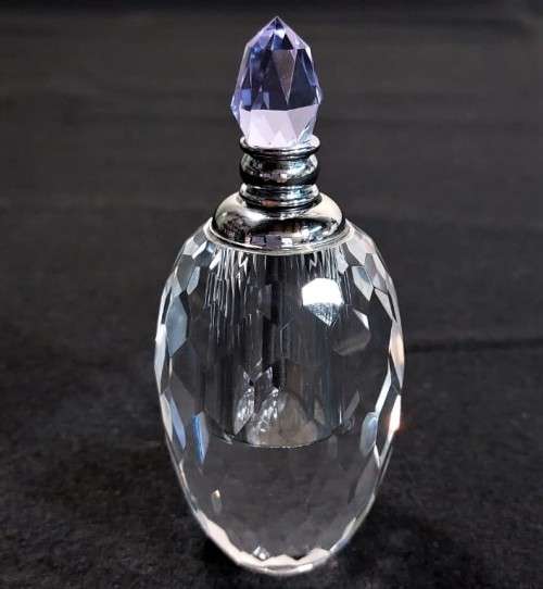 VINTAGE CHRYSTAL GLASS PERFUME BOTTLE WITH PURPLE COLOURED FACETTED STOPPER