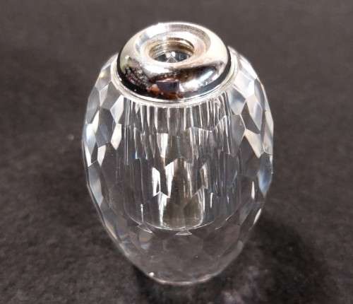 VINTAGE CHRYSTAL GLASS PERFUME BOTTLE WITH PURPLE COLOURED FACETTED STOPPER