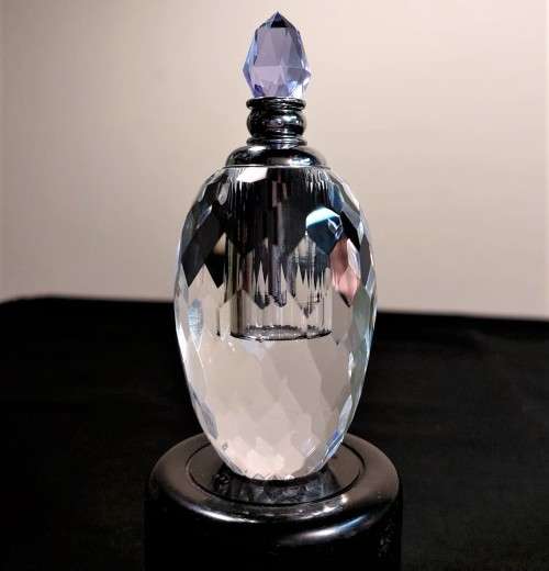 VINTAGE CHRYSTAL GLASS PERFUME BOTTLE WITH PURPLE COLOURED FACETTED STOPPER