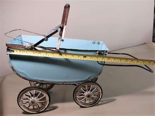 VINTAGE 1950S TRI-ANG DOLL PRAM IN A CYAN BLUE - NO HOOD BUT SUSPENSION OK AND WHEELS TURNS FREELY