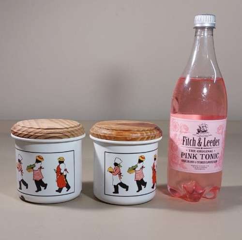 PAIR OF DECORATED ENAMEL SUGAR OR BISCUIT CONTAINERS WITH WOODEN LIDS