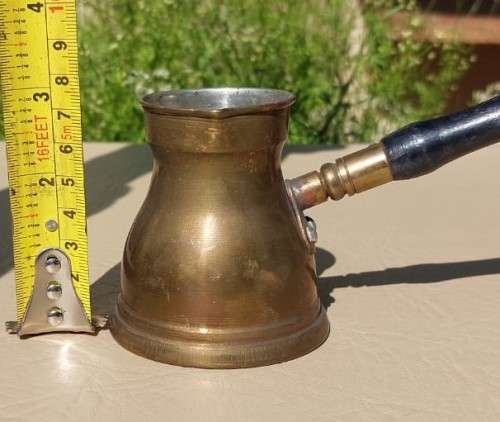 FOUR TURKISH OR GREEK OR ARABIC BRASS COFFEE POTS (CEZVES OR BRIKIS OR JADWHAS)
