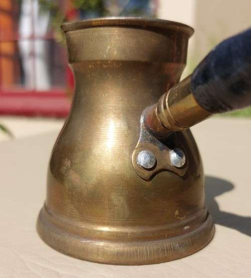 FOUR TURKISH OR GREEK OR ARABIC BRASS COFFEE POTS (CEZVES OR BRIKIS OR JADWHAS)