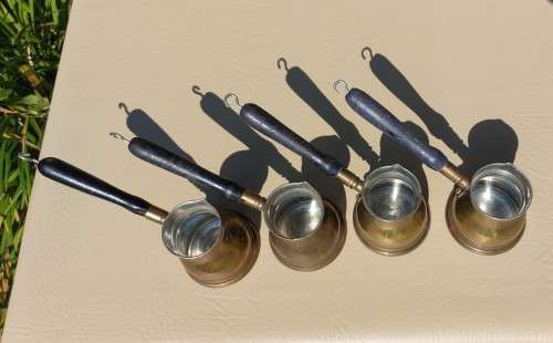 FOUR TURKISH OR GREEK OR ARABIC BRASS COFFEE POTS (CEZVES OR BRIKIS OR JADWHAS)