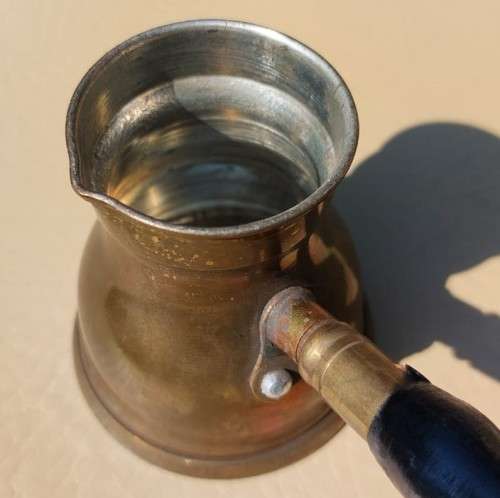 FOUR TURKISH OR GREEK OR ARABIC BRASS COFFEE POTS (CEZVES OR BRIKIS OR JADWHAS)