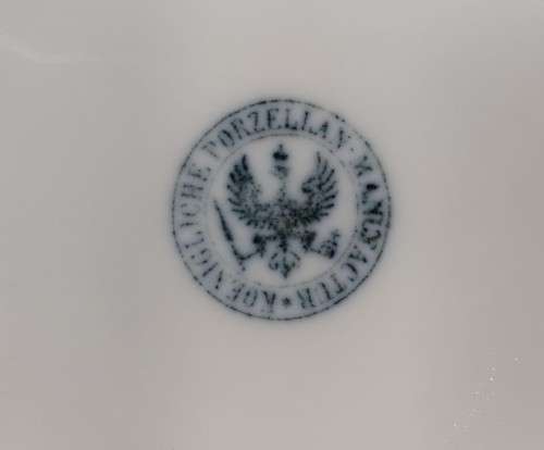 ANTIQUE (1847-1849) GERMAN KPM CUP AND SAUCER WITH RARE EAGLE AND SCEPTER MARK IN SHADES OF PURPLE