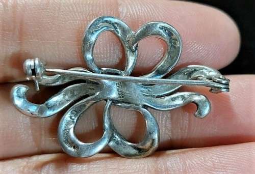 VINTAGE STERLING SILVER AND MARQUISITE BOW AND RIBBON BROOCH