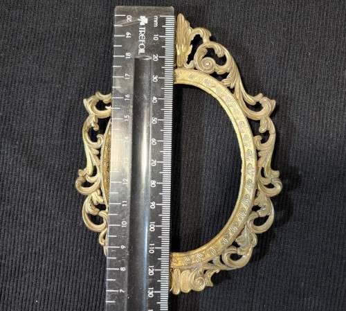 FOUR (4) SMALL (13x9CM) OVAL BRASS PHOTO FRAMES MADE IN ITALY