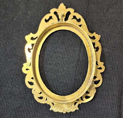FOUR (4) SMALL (13x9CM) OVAL BRASS PHOTO FRAMES MADE IN ITALY
