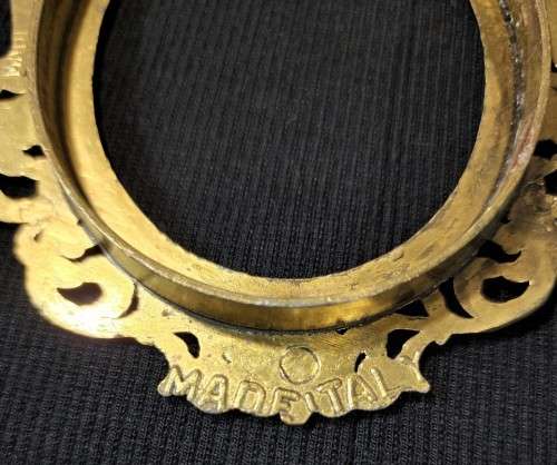 FOUR (4) SMALL (13x9CM) OVAL BRASS PHOTO FRAMES MADE IN ITALY