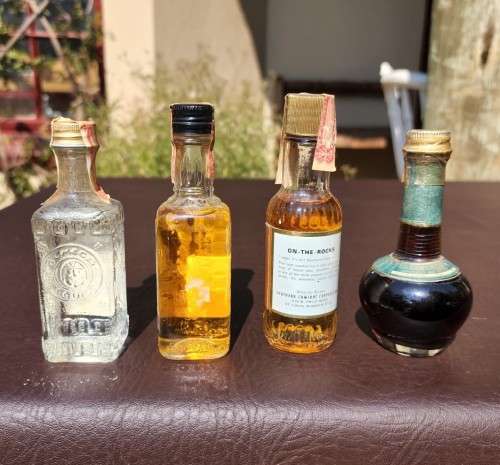 COLLECTION OF FOUR (4) USA ISRAEL AND MEXICO MINIATURE LIQUOR BOTTLES (SEALED FULL) LISTING 6 OF 11