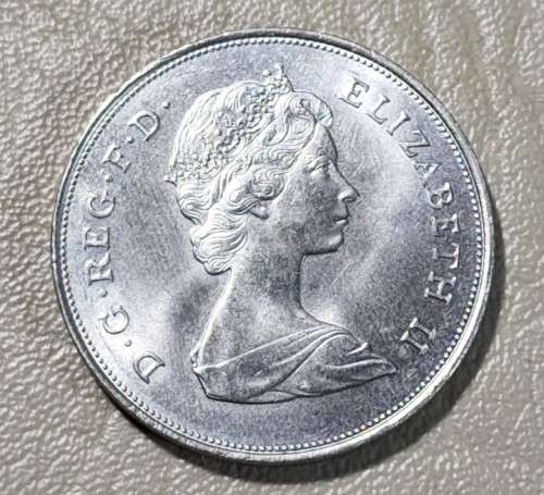 A 1981 ELIZABETH II PRINCE CHARLES AND DIANA SPENCER ROYAL WEDDING 25 NEW PENCE COMMEMORATIVE COIN
