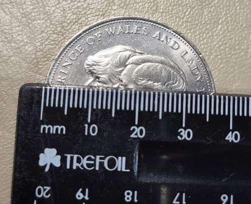 A 1981 ELIZABETH II PRINCE CHARLES AND DIANA SPENCER ROYAL WEDDING 25 NEW PENCE COMMEMORATIVE COIN