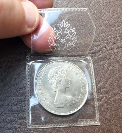 A 1981 ELIZABETH II PRINCE CHARLES AND DIANA SPENCER ROYAL WEDDING 25 NEW PENCE COMMEMORATIVE COIN