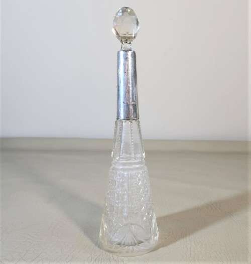 A 1910 DAVID LOEBL SCHINDLER and CO STERLING SILVER COLLAR ON A TALL CYLINDRICAL GLASS SCENT BOTTLE