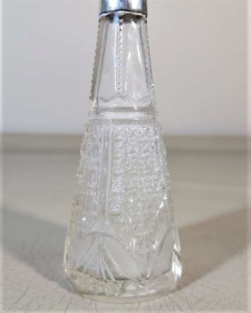 A 1910 DAVID LOEBL SCHINDLER and CO STERLING SILVER COLLAR ON A TALL CYLINDRICAL GLASS SCENT BOTTLE