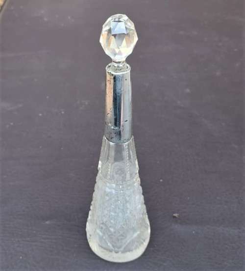 A 1910 DAVID LOEBL SCHINDLER and CO STERLING SILVER COLLAR ON A TALL CYLINDRICAL GLASS SCENT BOTTLE