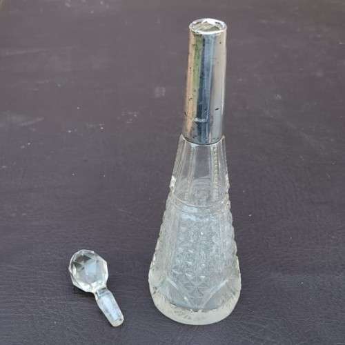 A 1910 DAVID LOEBL SCHINDLER and CO STERLING SILVER COLLAR ON A TALL CYLINDRICAL GLASS SCENT BOTTLE