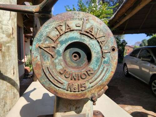 A VINTAGE 1940S FARM ALFA LAVAL SWEDEN JUNIOT NO 15 MILK SEPARATOR