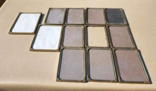 BATCH OF TWELVE (12) BRASS COLOURED METAL DESK PHOTO FRAMES