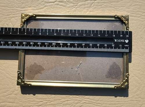 BATCH OF TWELVE (12) BRASS COLOURED METAL DESK PHOTO FRAMES