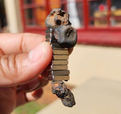 GROUP OF POSSIBLE METEORITE FRAGMENTS 4 BILLION YEARS OLD CONTAINS IRON NICKEL MAGNETIC AS SEEN IN P