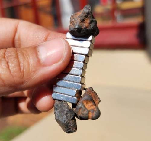GROUP OF POSSIBLE METEORITE FRAGMENTS 4 BILLION YEARS OLD CONTAINS IRON NICKEL MAGNETIC AS SEEN IN P
