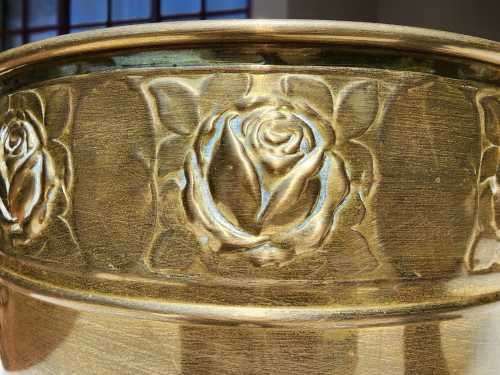 LARGE BRASS PLANTER WITH ROSE EMBOSSED BAND AND DOORKNOB HANDLES