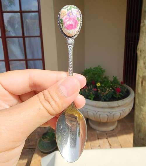 SET OF SIX FRENCH ROSE DECORATED ENAMELLED OVAL HANDLED STAINLESS STEEL TEA SPOONS