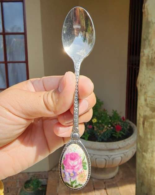 SET OF SIX FRENCH ROSE DECORATED ENAMELLED OVAL HANDLED STAINLESS STEEL TEA SPOONS