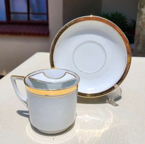 NEAR ANTIQUE (1925-1932) GENTLEMANS MOUSTACHE CUP AND SAUCER BY AUSTRIAN CARL TIELSCH ALTWASSER