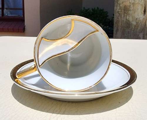 NEAR ANTIQUE (1925-1932) GENTLEMANS MOUSTACHE CUP AND SAUCER BY AUSTRIAN CARL TIELSCH ALTWASSER