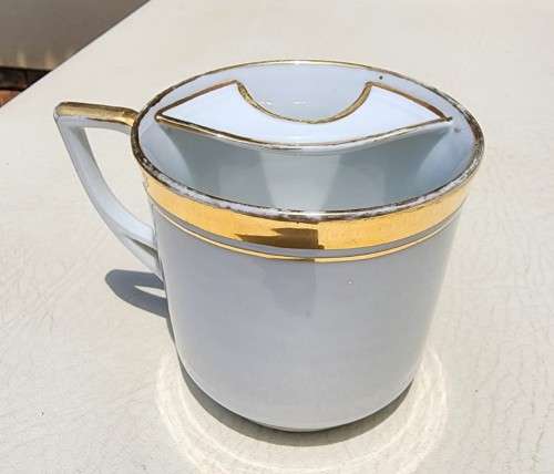 NEAR ANTIQUE (1925-1932) GENTLEMANS MOUSTACHE CUP AND SAUCER BY AUSTRIAN CARL TIELSCH ALTWASSER