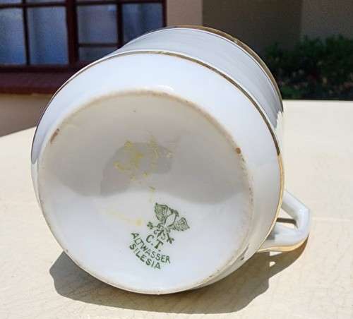 NEAR ANTIQUE (1925-1932) GENTLEMANS MOUSTACHE CUP AND SAUCER BY AUSTRIAN CARL TIELSCH ALTWASSER