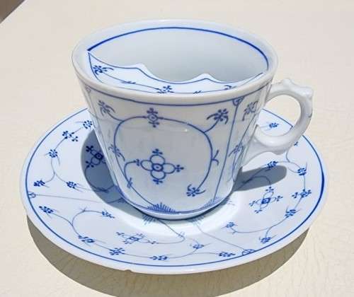 ANTIQUE GENTLEMANS MOUSTACHE (1900-1930) CUP AND SAUCER BY GERMAN PORZELLANFABRIK KALK EISENBURG