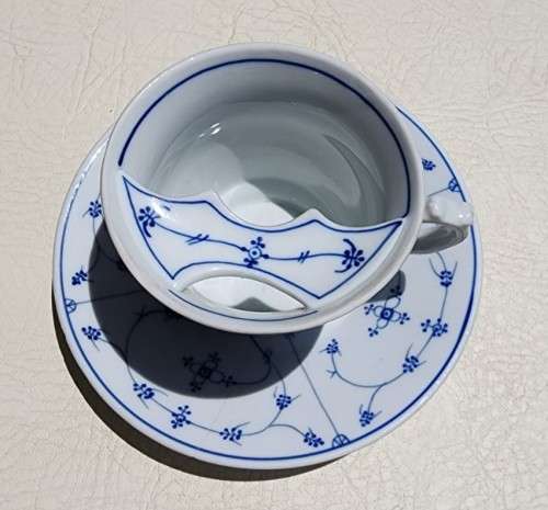 ANTIQUE GENTLEMANS MOUSTACHE (1900-1930) CUP AND SAUCER BY GERMAN PORZELLANFABRIK KALK EISENBURG