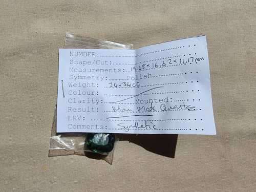 A LARGE MANMADE 24.34CARAT GREEN AMETHYST GEMSTONE WITH BEAUTIFUL CUSHION CUT