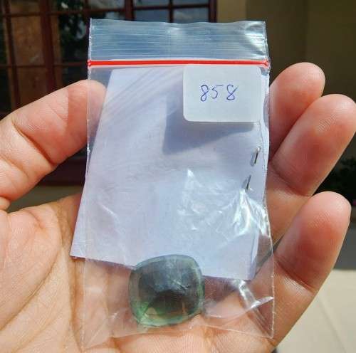 A LARGE MANMADE 24.34CARAT GREEN AMETHYST GEMSTONE WITH BEAUTIFUL CUSHION CUT