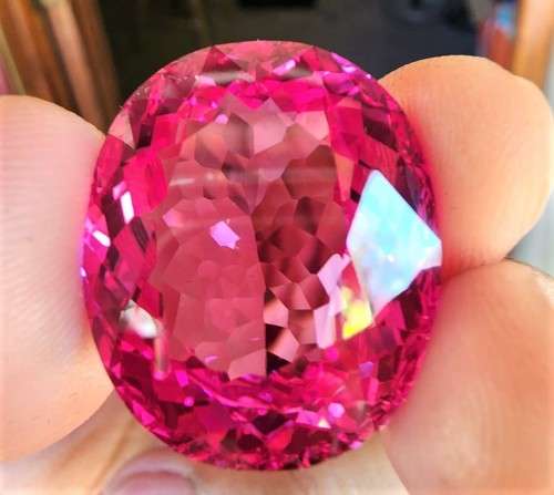 LARGE 50.35CT PINK TOPAZ GEMSTONE WITH OVAL CUT - STRONG RED UV FLUORESCENCE! - POSSIBLE SAPPHIRE!