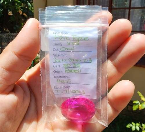 LARGE 50.35CT PINK TOPAZ GEMSTONE WITH OVAL CUT - STRONG RED UV FLUORESCENCE! - POSSIBLE SAPPHIRE!