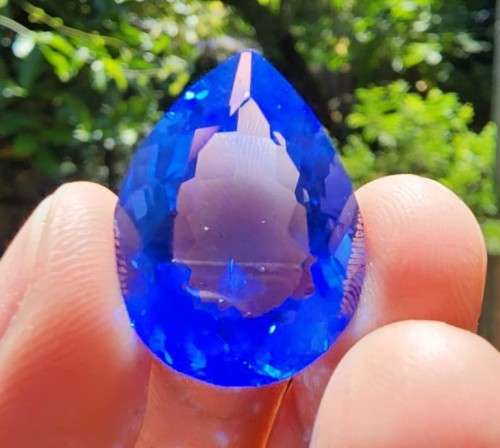 LARGE 23.19CT SWISS BLUE TOPAZ GEMSTONE WITH BEAUTIFUL PEAR CUT - IRRADIATED FOR 2 YEARS!
