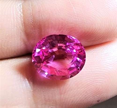 PINK 5,05CT SAPPHIRE WITH LOVELY OVAL CUT - UV RED! - THERMAL HIGH! - ONE OF 4 SAPPHIRES ON AUCTION