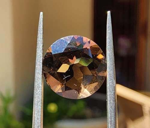 PARCEL OF 5 SMOKY QUARTZ SALMON BROWN GEMSTONES (ON AVERAGE 1,85CT)WITH ROUND CUT ONE BID TAKES ALL!