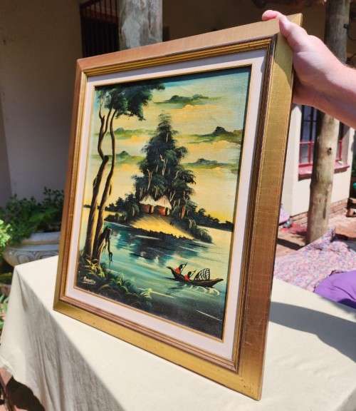 AFRICAN VILLAGE SCENE BY KENYAN ARTIST MADIMBA AN ORIGINAL 1960S OIL ON BOARD