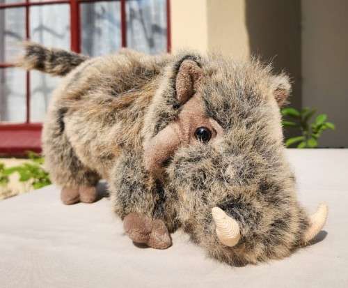 BORN IN SOUTH AFRICA A WARTHOG PLUSH TOY WITH WARTS AND ALL