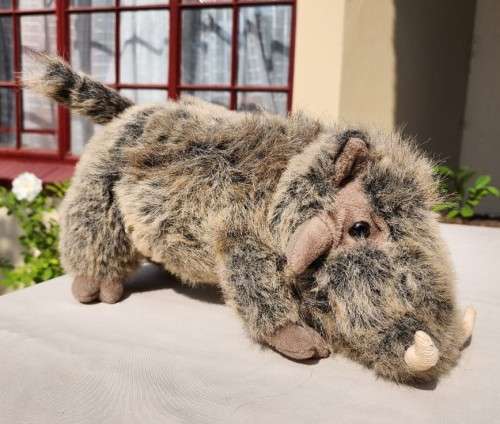 BORN IN SOUTH AFRICA A WARTHOG PLUSH TOY WITH WARTS AND ALL