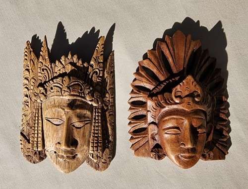 PAIR OF SOUTH EAST ASIA WOODEN CARVED DIETY MASKS